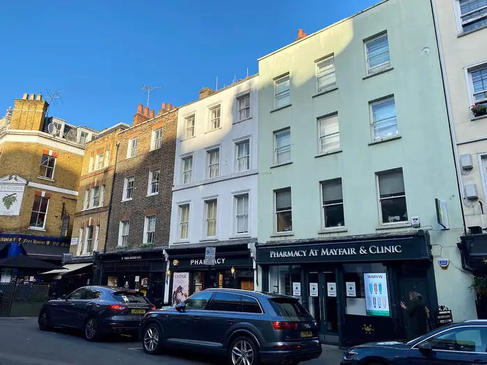 Painted townhouses and shopfronts in Shepherd Market, Mayfair