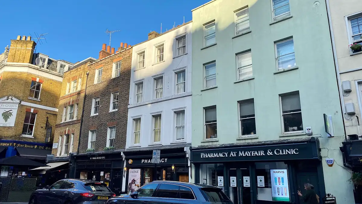 Painted townhouses and shopfronts in Shepherd Market, Mayfair